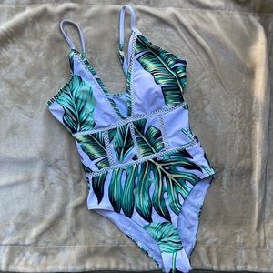 1-piece swim suit. Never worn!